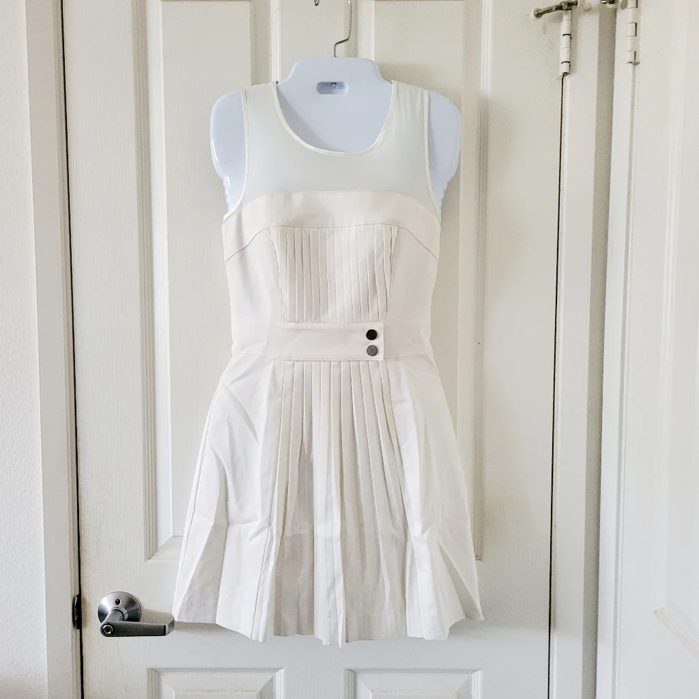 Bebe | Cute Ivory Pleated Sleeveless Fit & Flare Cocktail Dress - Picture 3 of 15